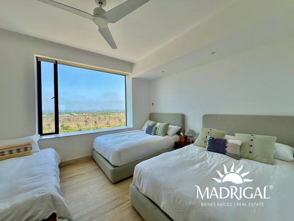 El Palmar Tres Vidas | Departamento en venta en Torre Baru en quinto piso de cuatro recámaras frente al mar